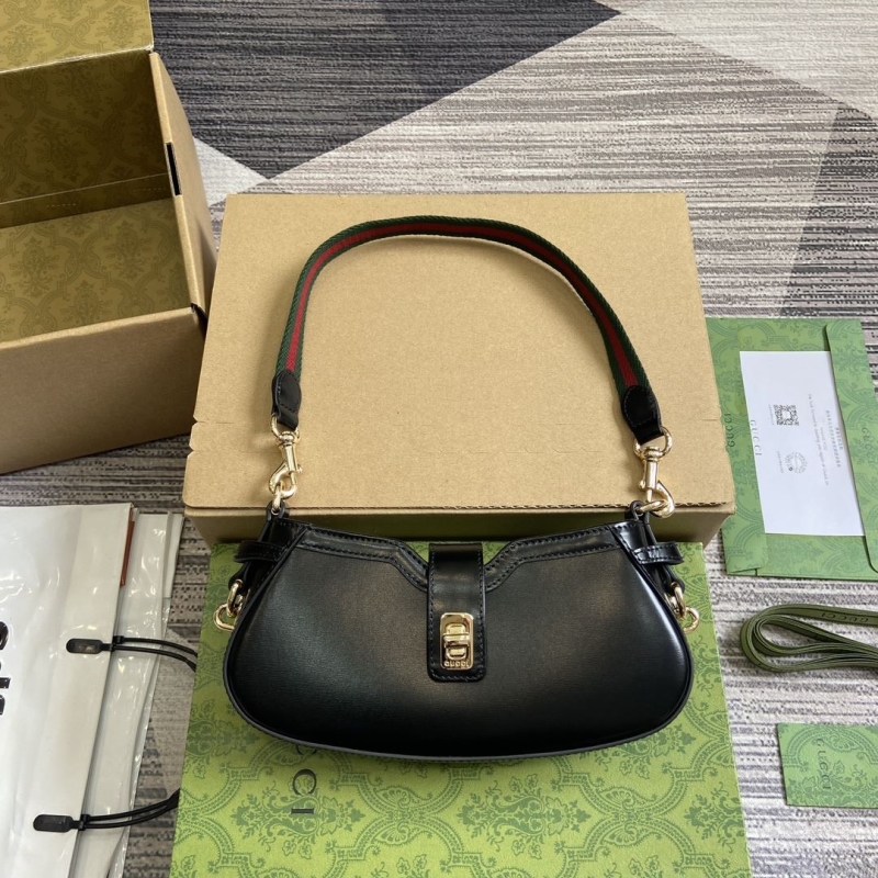 G*u*i top handle bags